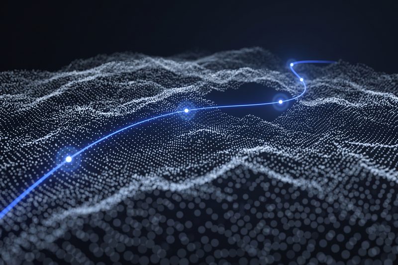 A single trajectory arcing through a cloud of data points, with four waypoints along it